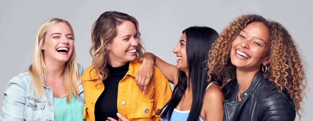Group-Studio-Portrait-Of-Multi-Cultural-Female-Friends