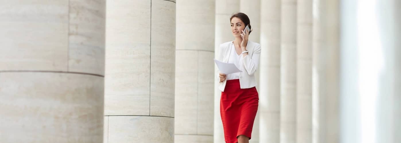 Businesswoman Speaking by Phone Outdoors