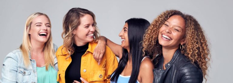 Group Studio Portrait Of Multi-Cultural Female Friends